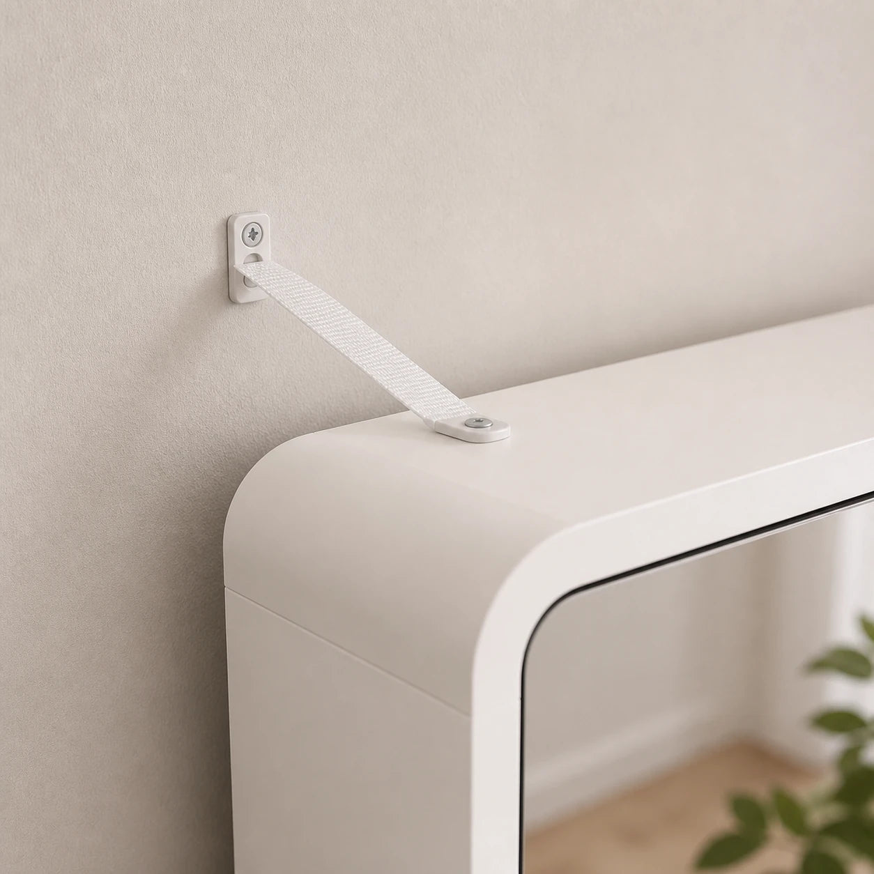 Anti-tip hardware detail for the mirrored shoe cabinet